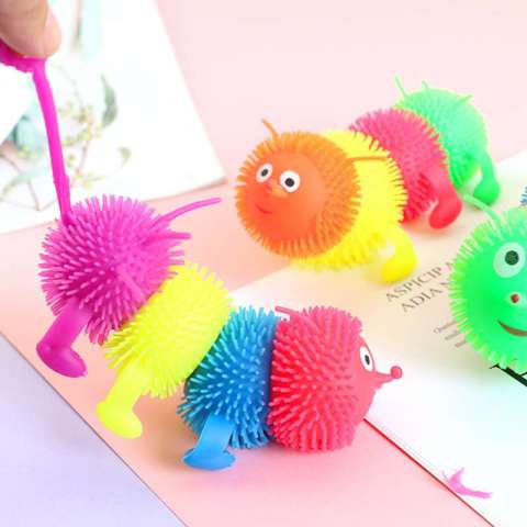 TONGLE wholesale TPR soft plastic flashing caterpillar Puffer toy Worm Puffer Ball